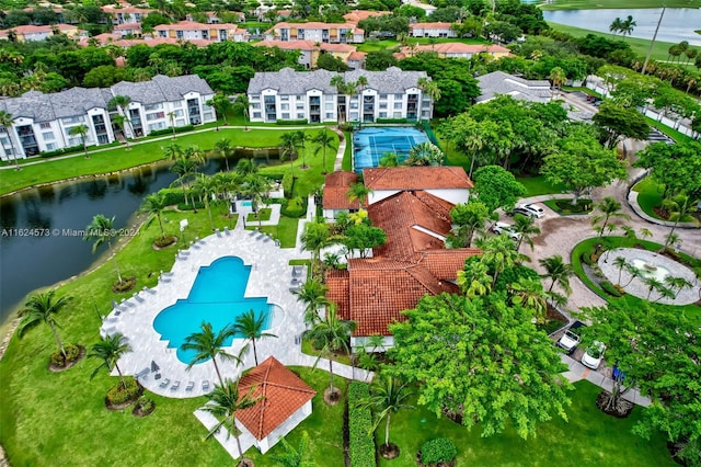 drone / aerial view with a water view