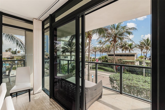 interior space featuring floor to ceiling windows