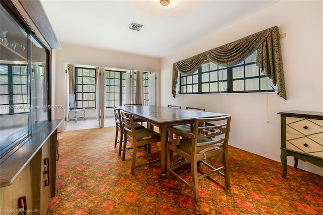 dining room featuring a healthy amount of sunlight