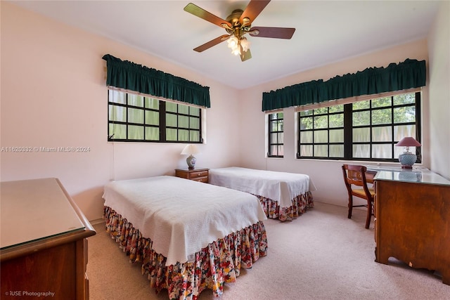 bedroom featuring carpet floors and ceiling fan