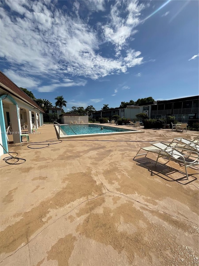 view of pool with a patio