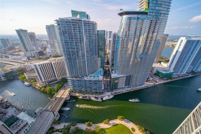 property's view of city featuring a water view