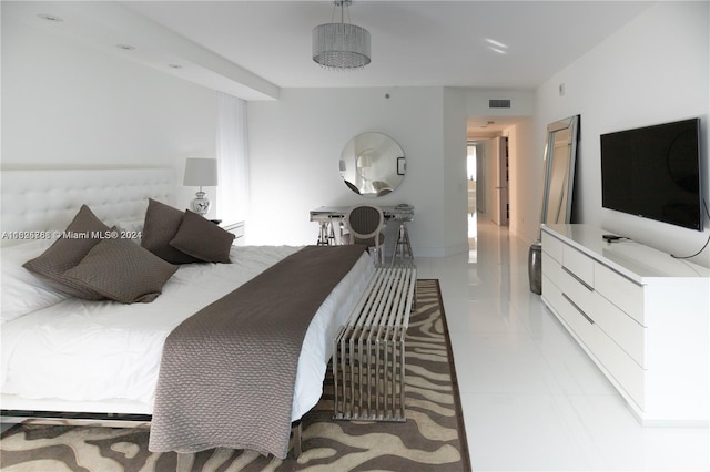 bedroom with light tile patterned flooring