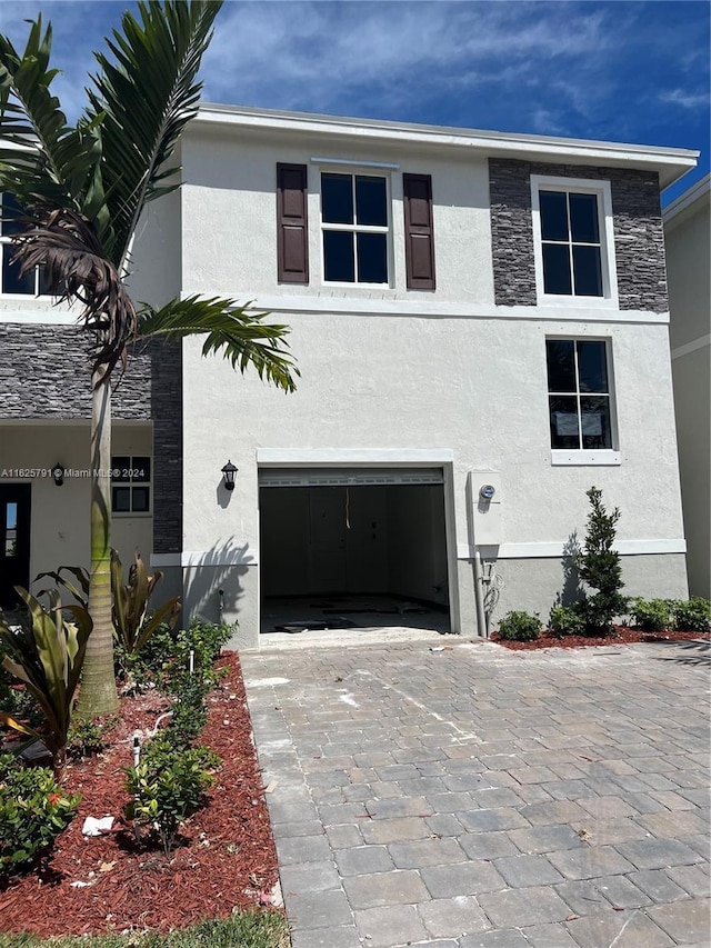 view of front of house with a garage