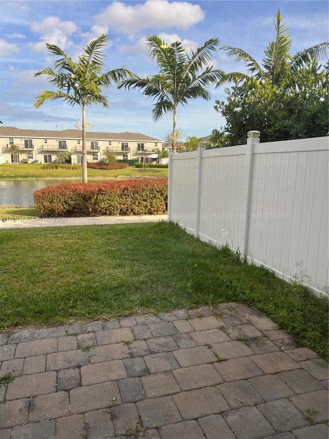 view of yard with a water view