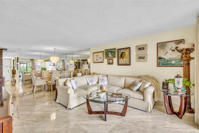 living room with a textured ceiling