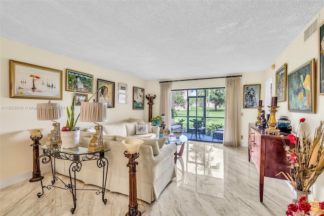 living room featuring a textured ceiling