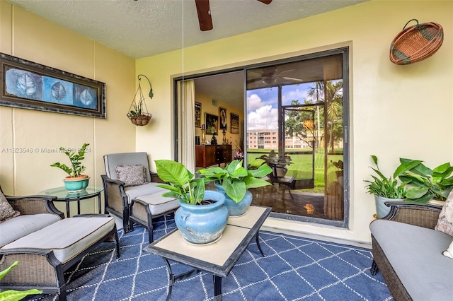 exterior space with ceiling fan