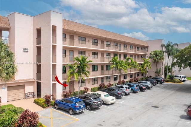 2606 NW 104th Ave Unit 106, Sunrise, FL 33322 - view of property with uncovered parking