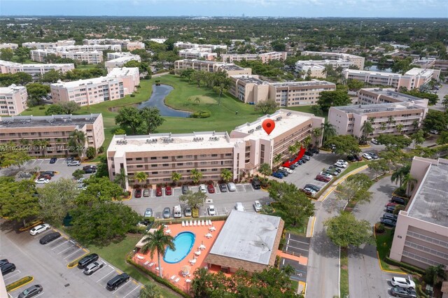 2606 NW 104th Ave Unit 106, Sunrise, FL 33322 - bird's eye view with view of golf course and a water view