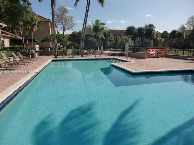 view of pool with a patio area