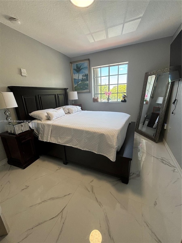 bedroom with a textured ceiling