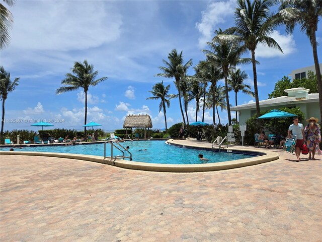 view of swimming pool featuring a patio