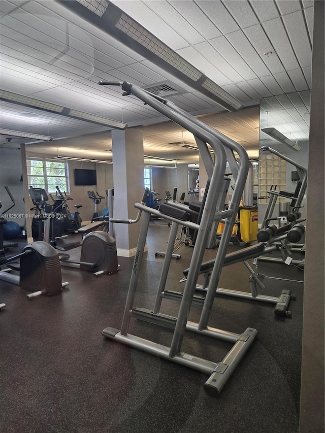 exercise room with baseboards