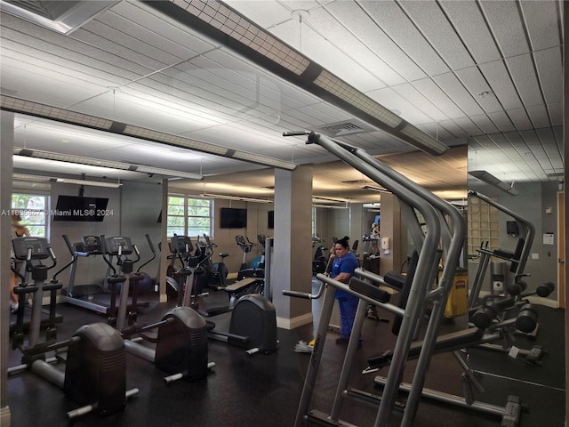 workout area with visible vents and baseboards