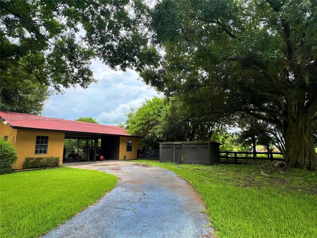 ranch-style house with a front lawn