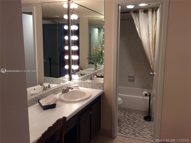 full bathroom with vanity, tile patterned flooring, toilet, and bathing tub / shower combination