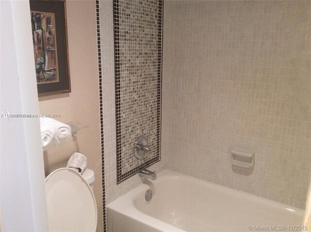 bathroom featuring toilet