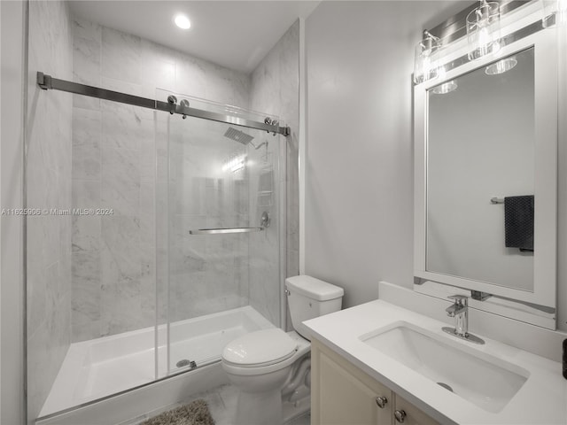 bathroom featuring walk in shower, tile patterned flooring, toilet, and vanity