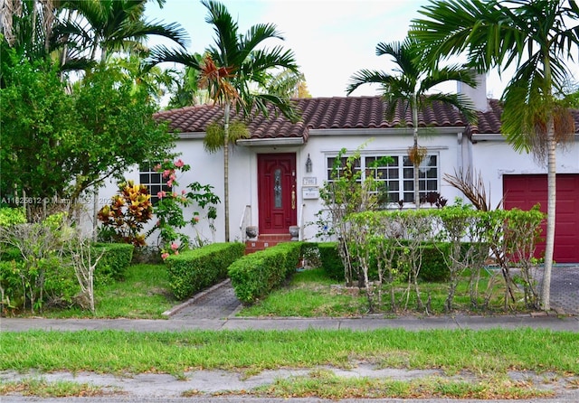 view of front of home with a garage