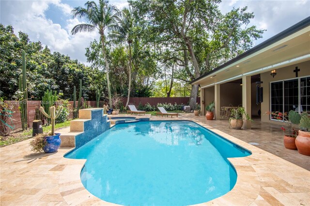 view of pool featuring a patio area