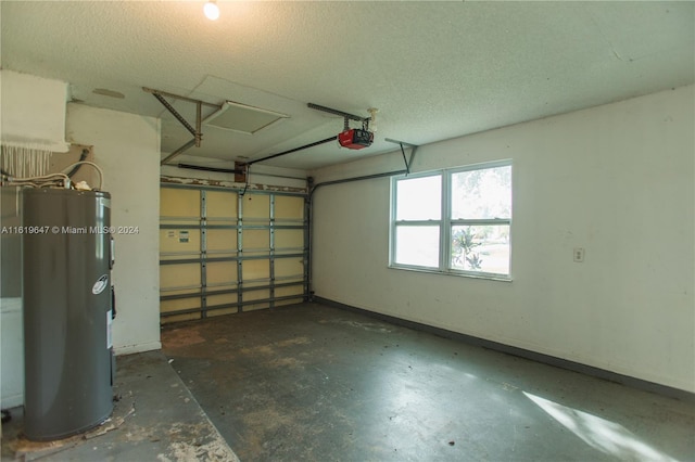 garage featuring electric water heater and a garage door opener