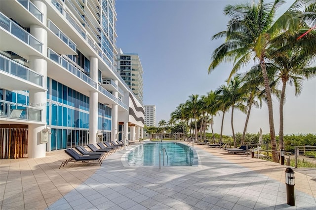 view of pool featuring a patio area