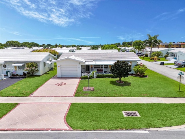 ranch-style house featuring a front lawn