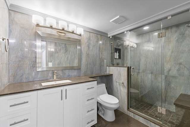 bathroom with an enclosed shower, vanity, ornamental molding, and toilet