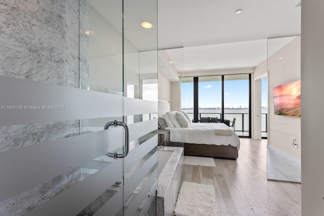 480 NE 31st St Unit 1005, Miami, FL 33137 - bedroom featuring wood finished floors and recessed lighting