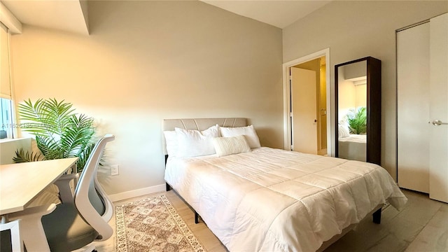480 NE 31st St Unit 1005, Miami, FL 33137 - bedroom featuring light wood-type flooring and baseboards