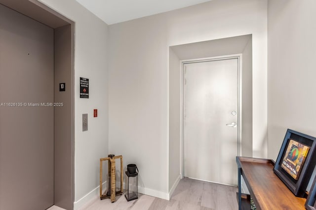 480 NE 31st St Unit 1005, Miami, FL 33137 - foyer featuring elevator and baseboards