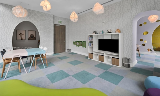 480 NE 31st St Unit 1005, Miami, FL 33137 - living room with arched walkways and tile patterned floors