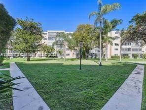 view of community with a lawn