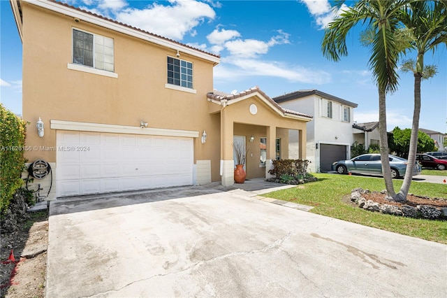 view of front of home with a garage