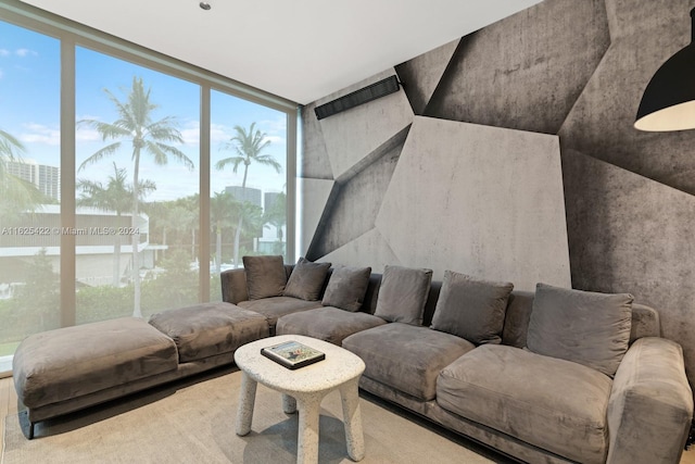 living room with carpet and expansive windows