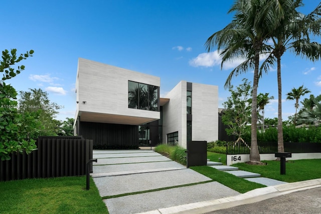 modern home with a front yard