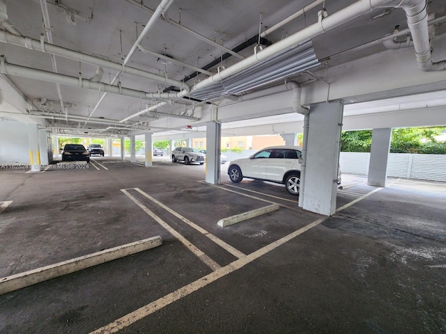 garage featuring a carport