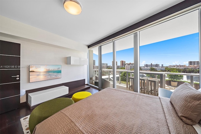 bedroom with dark hardwood / wood-style flooring