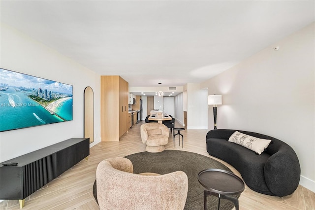 living room with light hardwood / wood-style floors