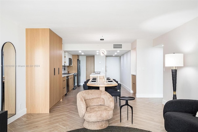 living room featuring light parquet floors