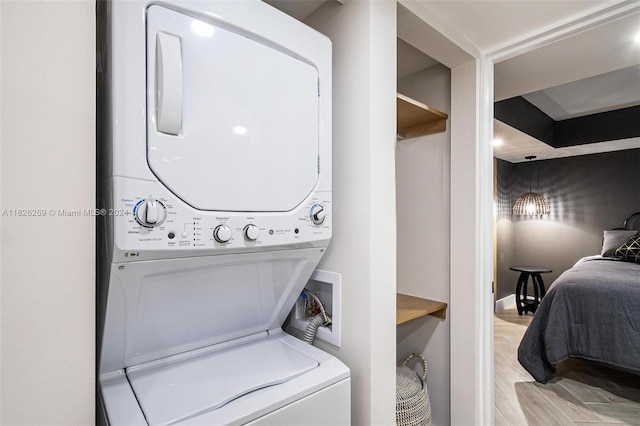 1717 N Bayshore Dr Unit A-3755, Miami, FL 33132 - laundry area featuring light wood finished floors, stacked washer / dryer, and laundry area