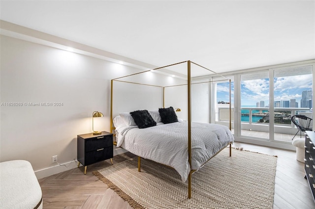 1717 N Bayshore Dr Unit A-3755, Miami, FL 33132 - bedroom featuring expansive windows, access to exterior, and baseboards