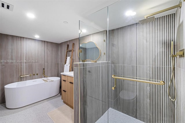 1717 N Bayshore Dr Unit A-3755, Miami, FL 33132 - full bathroom with vanity, speckled floor, a soaking tub, a tile shower, and visible vents
