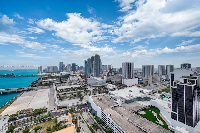 property's view of city with a water view