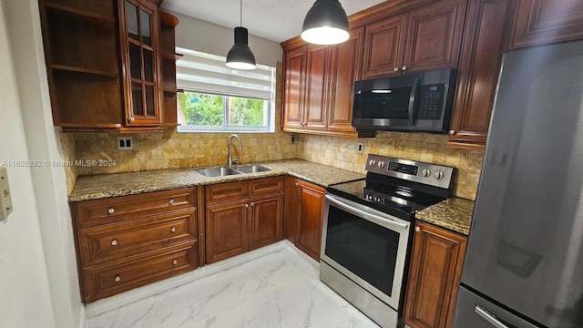 kitchen featuring sink, light stone counters, tasteful backsplash, hanging light fixtures, and stainless steel appliances