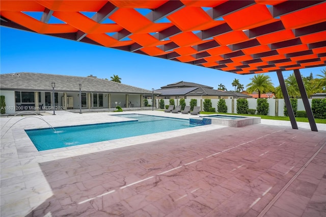 view of swimming pool with an in ground hot tub, pool water feature, a pergola, and a patio area