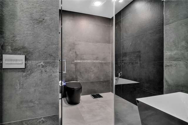 bathroom with tiled shower