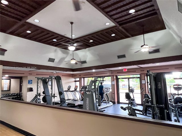 workout area featuring ceiling fan and visible vents