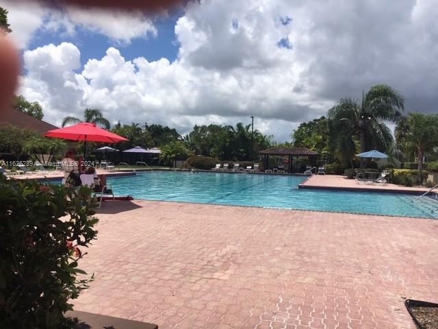 pool featuring a patio area